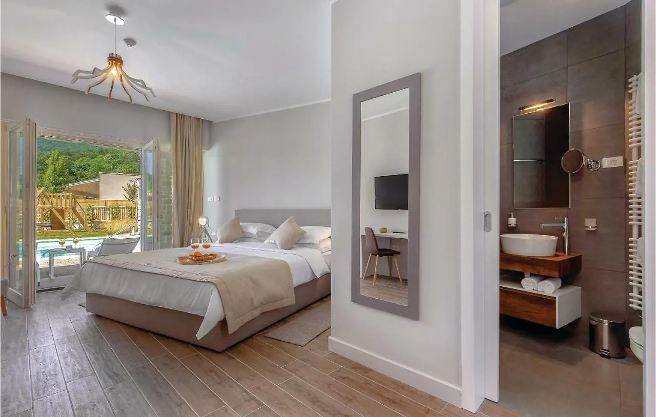 Four-Bedroom Holiday Home In Veprinac Croazia