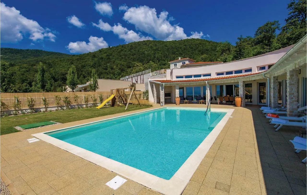 Four-Bedroom Holiday Home In Veprinac